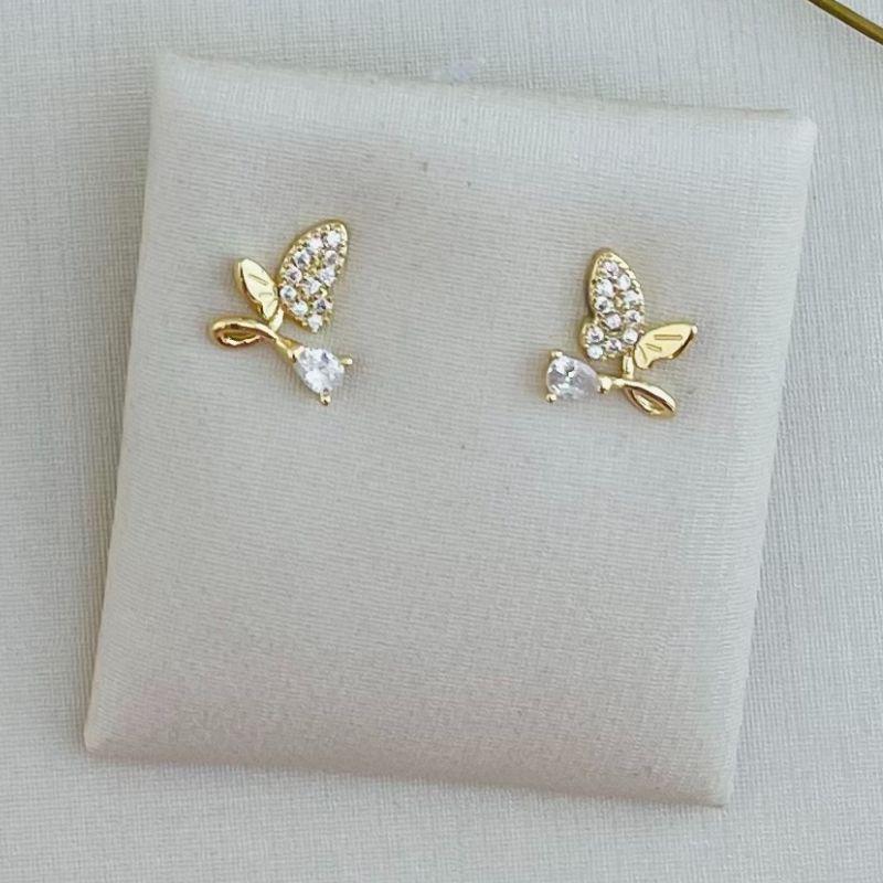 07.2282.1.O - Brinco borboleta assimétrica cravejada com ponto de luz gota
