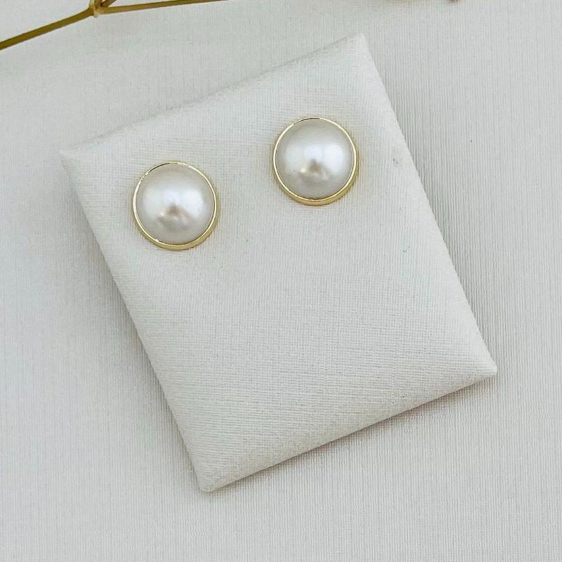 07.2300.15.O - (Tam. G) Brinco de pérola metade em cravação inglesa