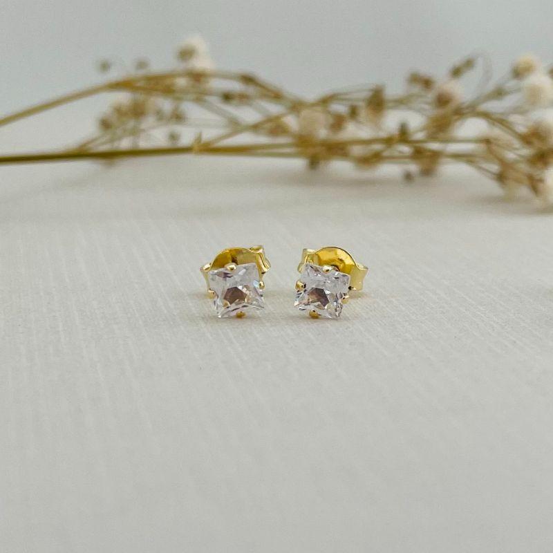 07.2302.1.O - Brinco ponto de luz em quadrado de quatro garras