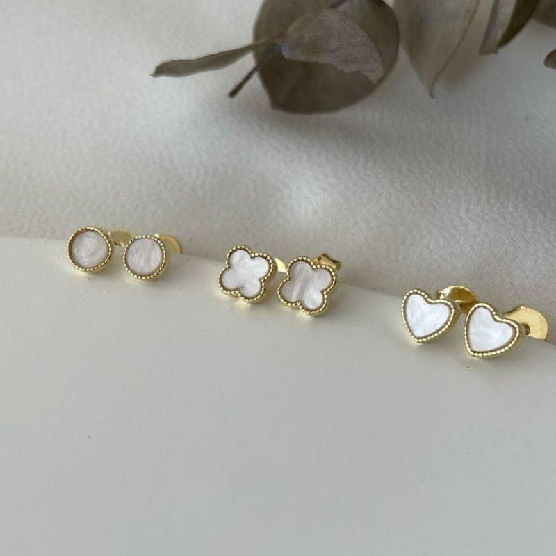 07.2610.15.O - Trio de brincos de formato diferentes com borda spikes