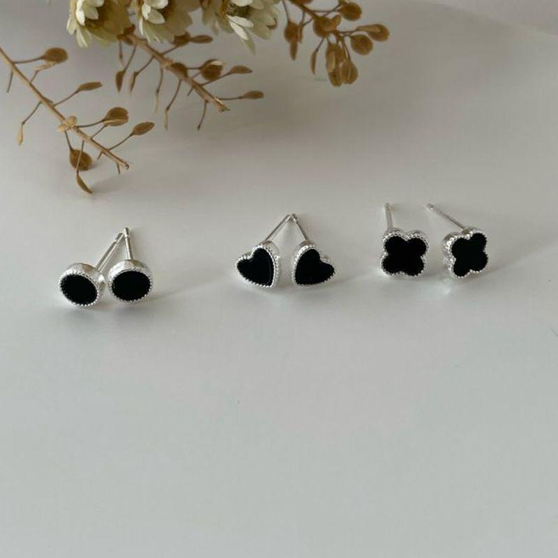 07.2610.2.S - Trio de brincos de formato diferentes com borda spikes