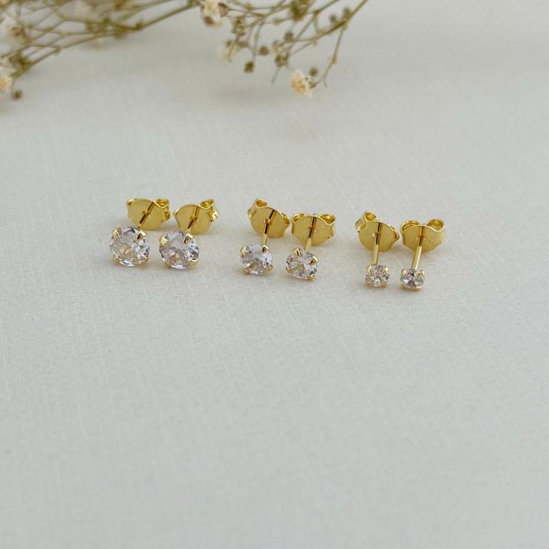 07.2651.1.O - Trio de brinco ponto de luz em cravação tulipa