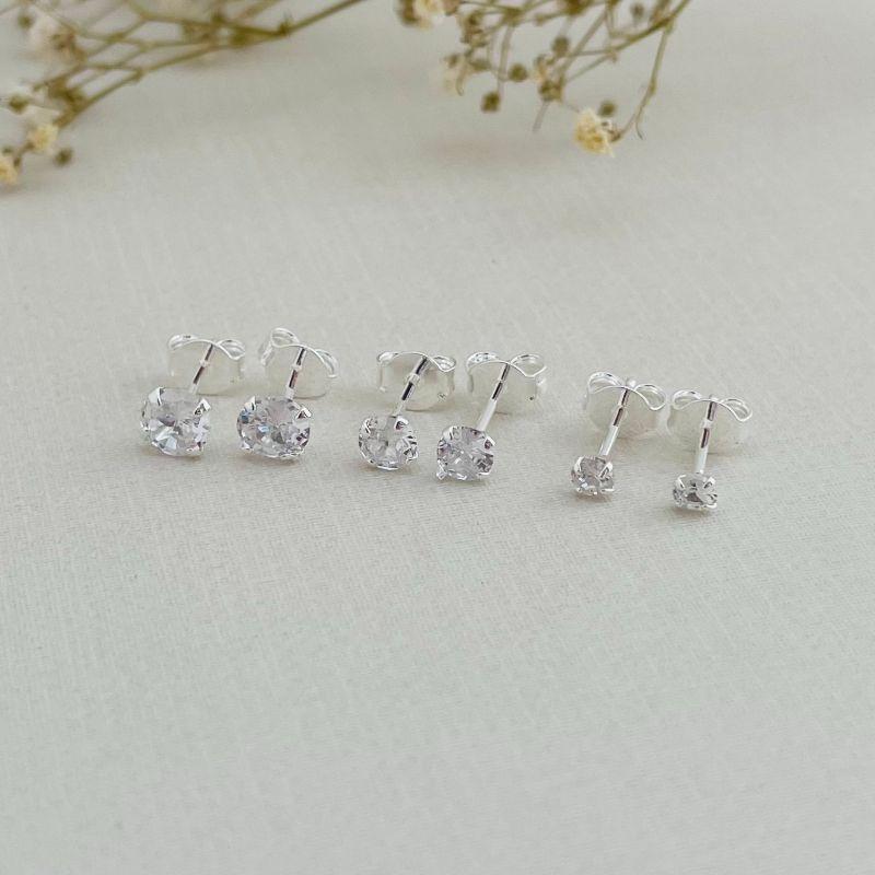 07.2651.1.S - Trio de brinco ponto de luz em cravação tulipa