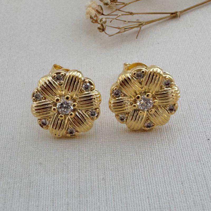 07.2656.1.O - Brinco de flor seis petalas longas com pontos de luz central e pontas