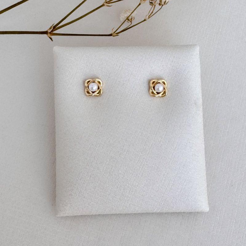 07.2694.15.O - (Tam.P) Brinco de efeito anéis planetários com pérola central