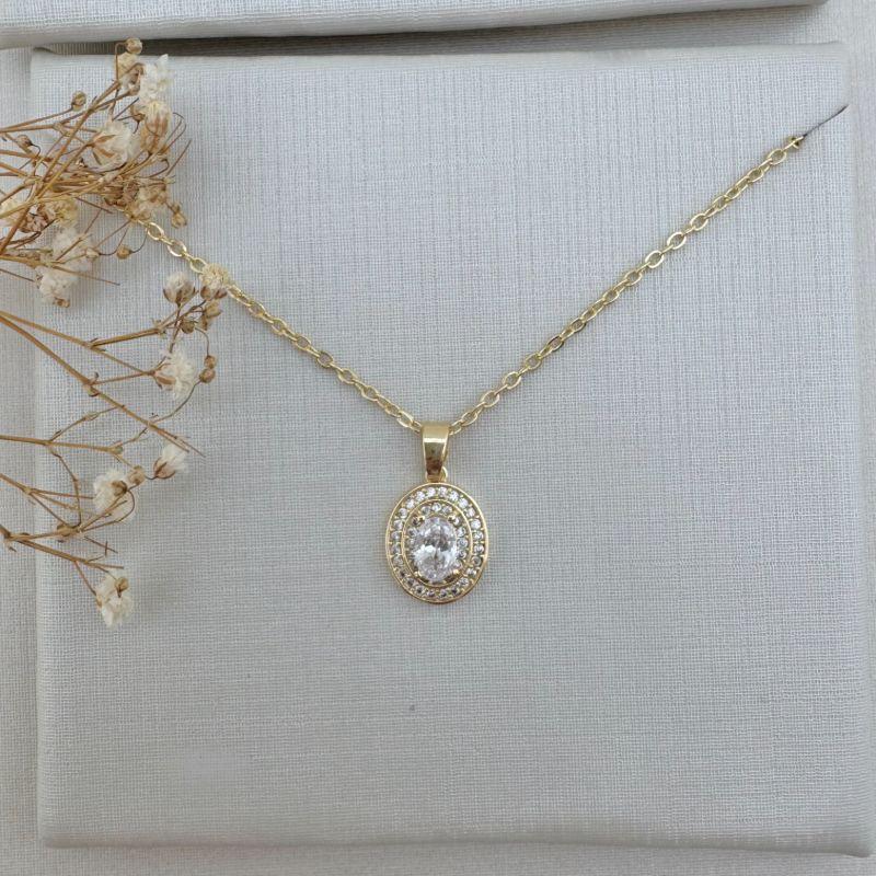 09.2291.1.O - (45) Colar de elos ovais com pingente ponto de luz oval com uma fileira em volta