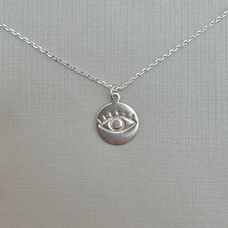 09.2308.1.S - (45) Colar medalha olho grego