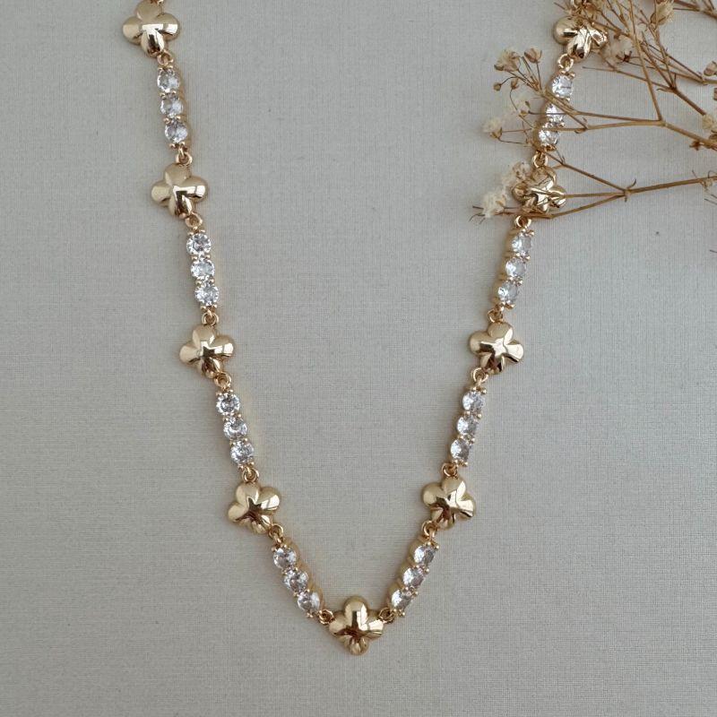 09.2334.1.O - (42) Colar de pontos de luz em trio com flor de Alhambra lisa entre eles