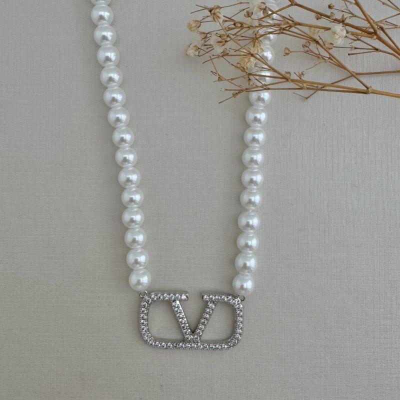 09.2337.15.S - (42) Colar de pérolas com pingente meio insp. LuisVitton