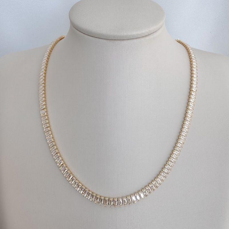 09.2341.1.O - (40) Colar de riviera em baguete com fecho relógio