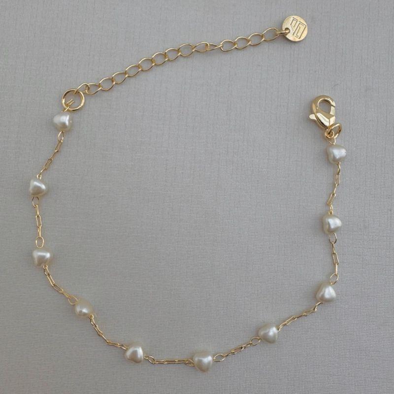 12.2133.15.O - Pulseira de elos longos com mini corações em pérola