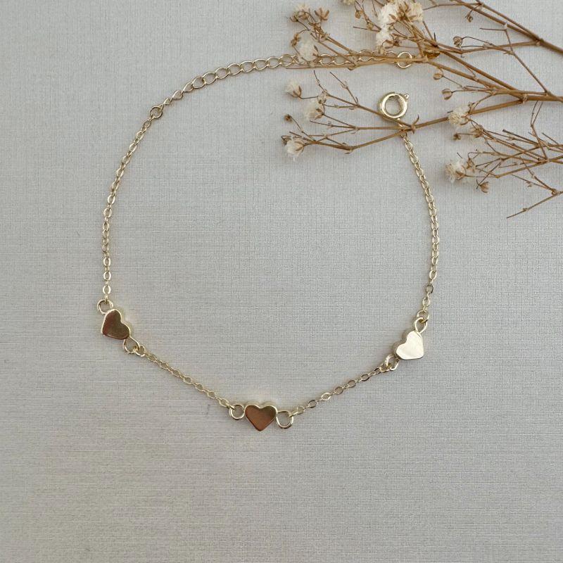 12.2160.0.O - Pulseira de elos ovais com três corações moeda lisos