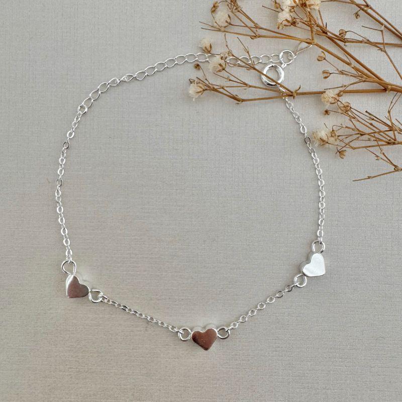 12.2160.0.S - Pulseira de elos ovais com três corações moeda lisos