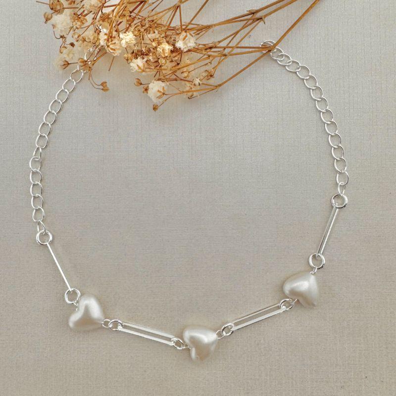 12.2167.15.S - Pulseira de elso extra longos com três corações em perolado