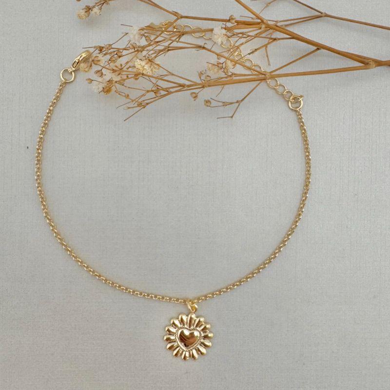 12.2169.0.O - Pulseira de elos portugues com pingente coração em raios lisos