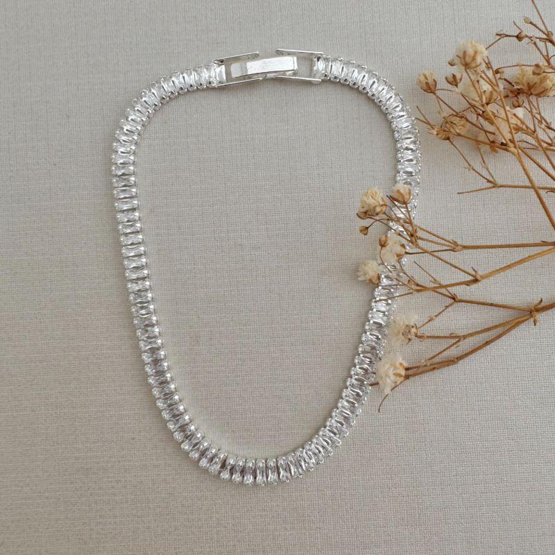 12.2173.1.S - Pulseira de riviera baguetes em vertical com fecho relógio