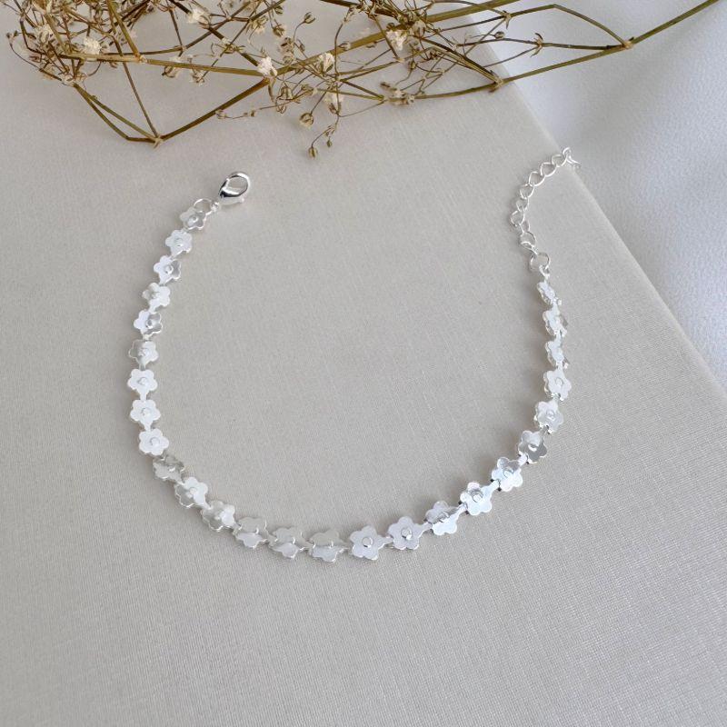 12.2179.0.S - Pulseira estilo fita toda em margaridas lisas