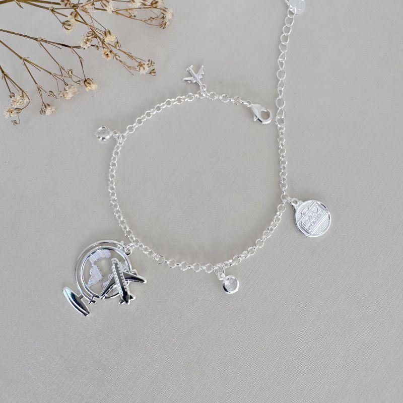 12.2183.0.S - Pulseira de elos portugueses com pingentes de viagens. Pulseira Avião