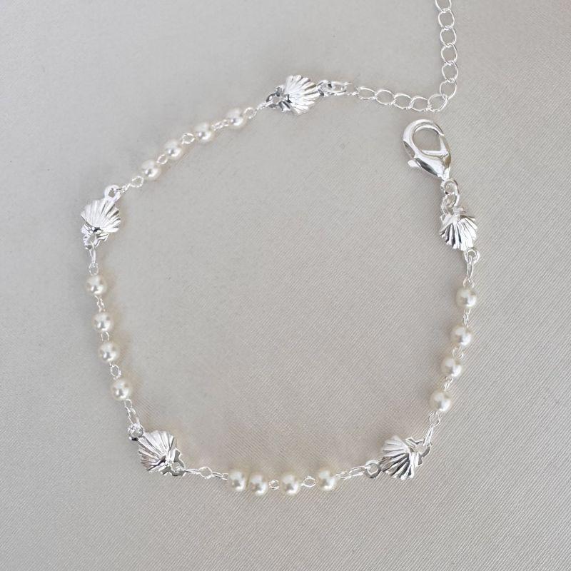 12.2185.15.S - Pulseira de pérolas com conchas lisas espaçadas