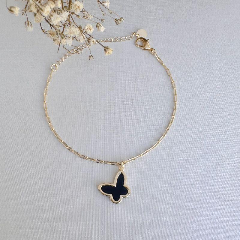12.2186.2.O - Pulseira de elos cartier com pingente de borboleta preta com borda