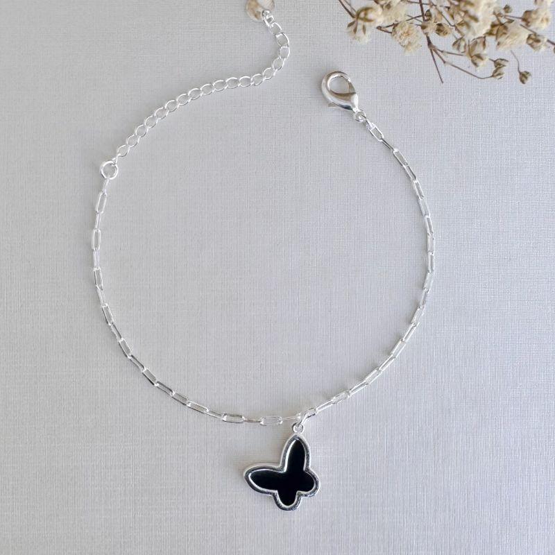 12.2186.2.S - Pulseira de elos cartier com pingente de borboleta preta com borda