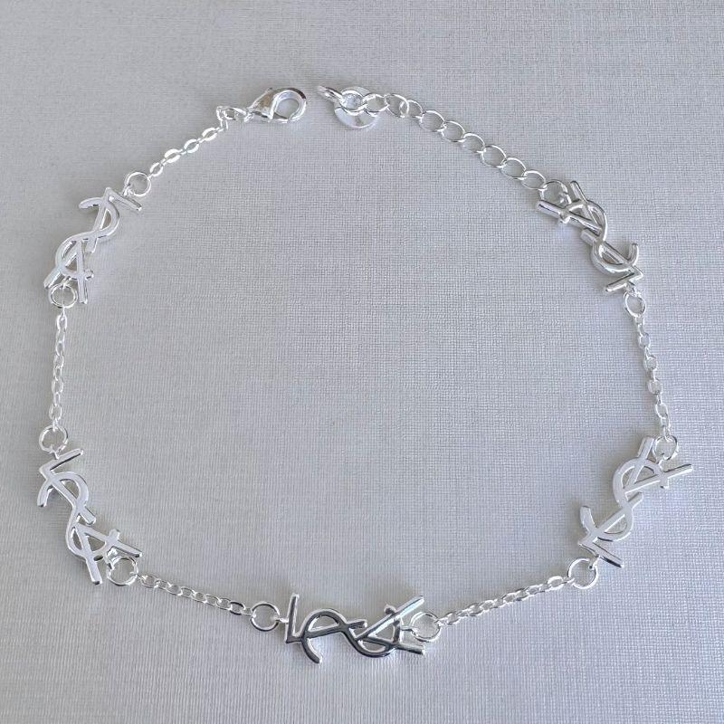 12.2187.0.S - Pulseira de elos circulares com letras polidas lisas. Insp Yves