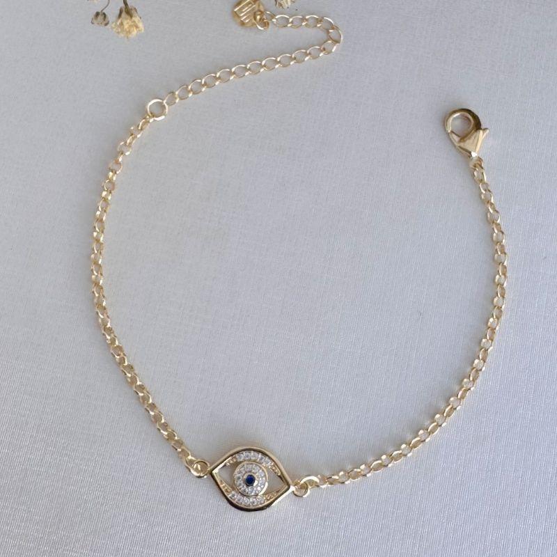 12.2187.1.O - Pulseira de elos portugueses com central olho cravejado