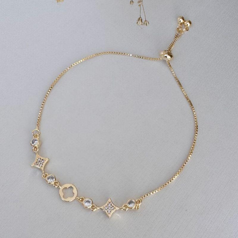 12.2190.1.O - Pulseira de circulo com corte alhambra e dois quadrados de pontas