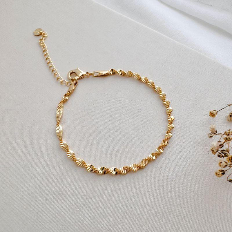 12.2203.0.O - Pulseira de malha fita placa em efeito espiral liso