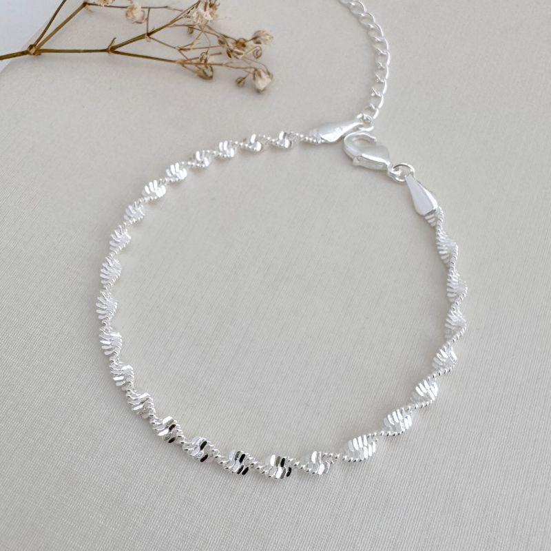 12.2203.0.S - Pulseira de malha fita placa em efeito espiral liso