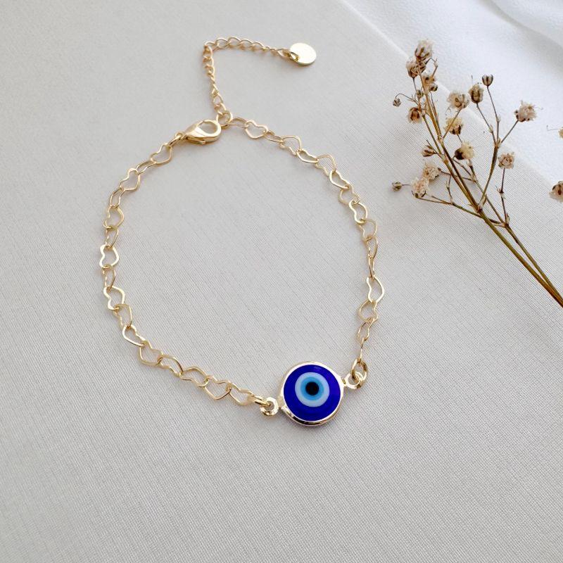 12.2204.20.O - Pulseira de elos coração com central olho grego