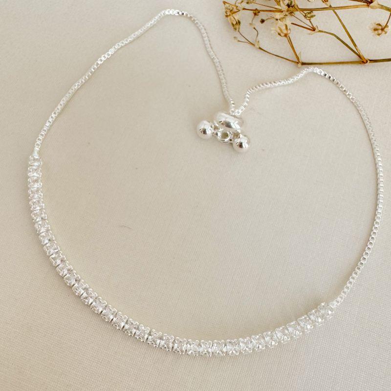 12.2210.1.S - Pulseira de riviera de duas garras com fecho gravata