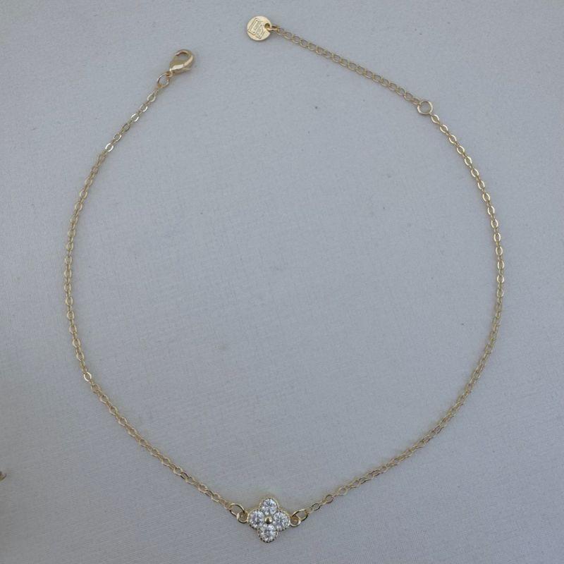 14.0685.1.O - Tornozeleira de elos ovais com central de flor alhambra (inspiração Van Cleef) em zircônia