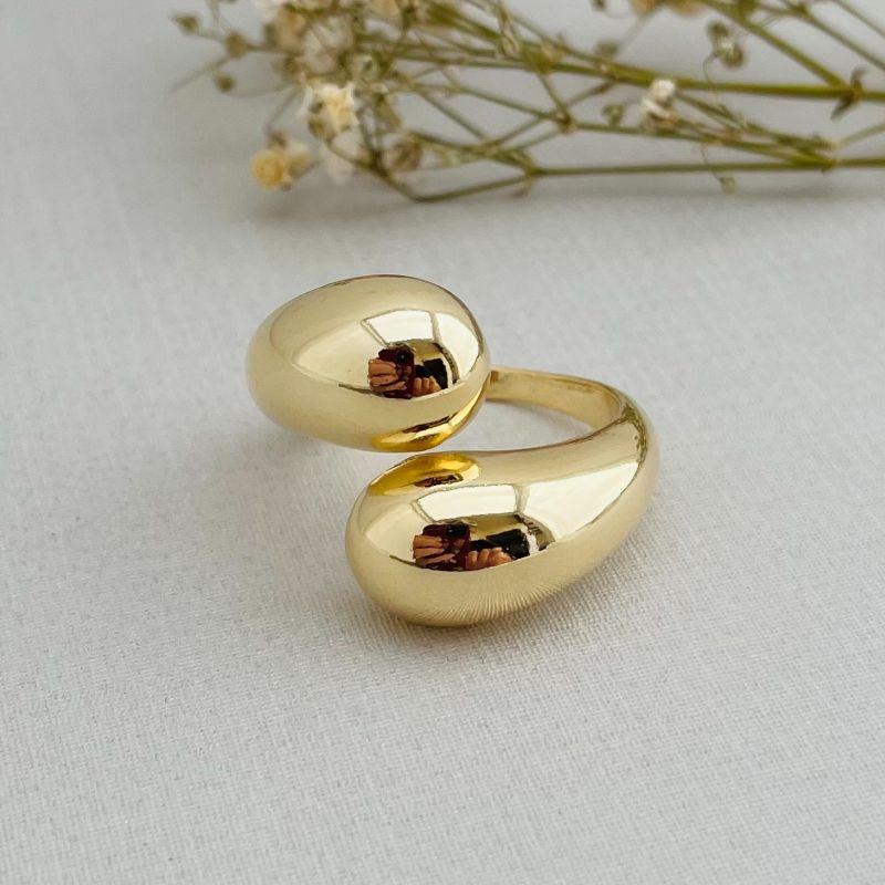 03.2229.0.O - (23 a 26) Anel aberto duas gotas grandes lisas transpassadas