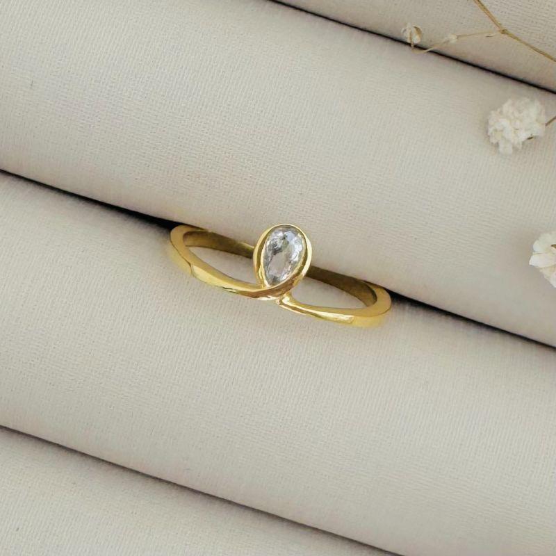 03.2243.1.O - (19) Anel de aro em laço com uma pedra em gota