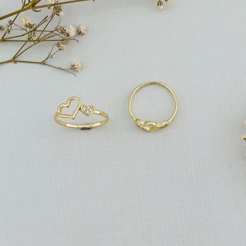 03.2250.1.O - (17) Aro fino com dois corações, uma silhueta lisa e outro cravejado