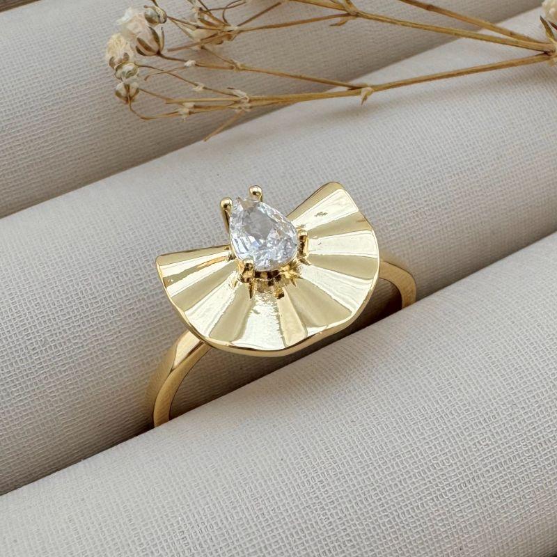 03.2280.1.O - (19) Anel de aro fino simples com leque liso e pedra oval central