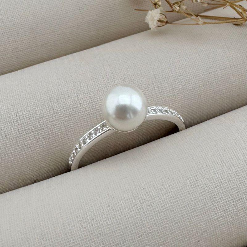 03.2289.15.S - (20) Anel de aro cravejado simples com uma pérola central