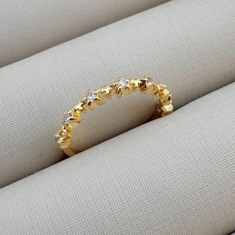 03.2298.1.O - (19) Anel estilo aparador em estrela com micro zircônia central