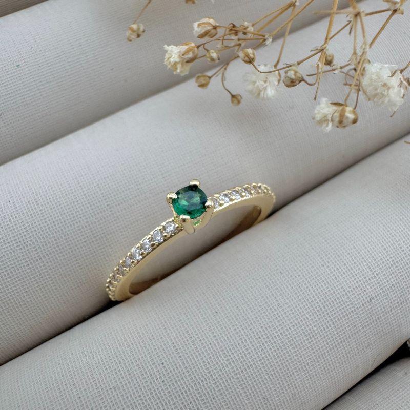 03.2336.5.O - (19) Anel solitário alto de quatro garras com aro cravejado