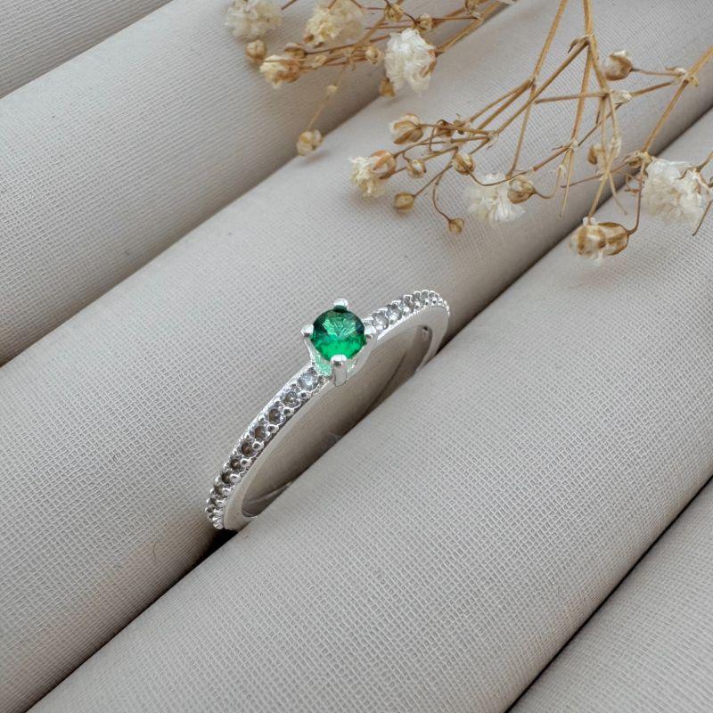 03.2336.5.S - (17) Anel solitário alto de quatro garras com aro cravejado