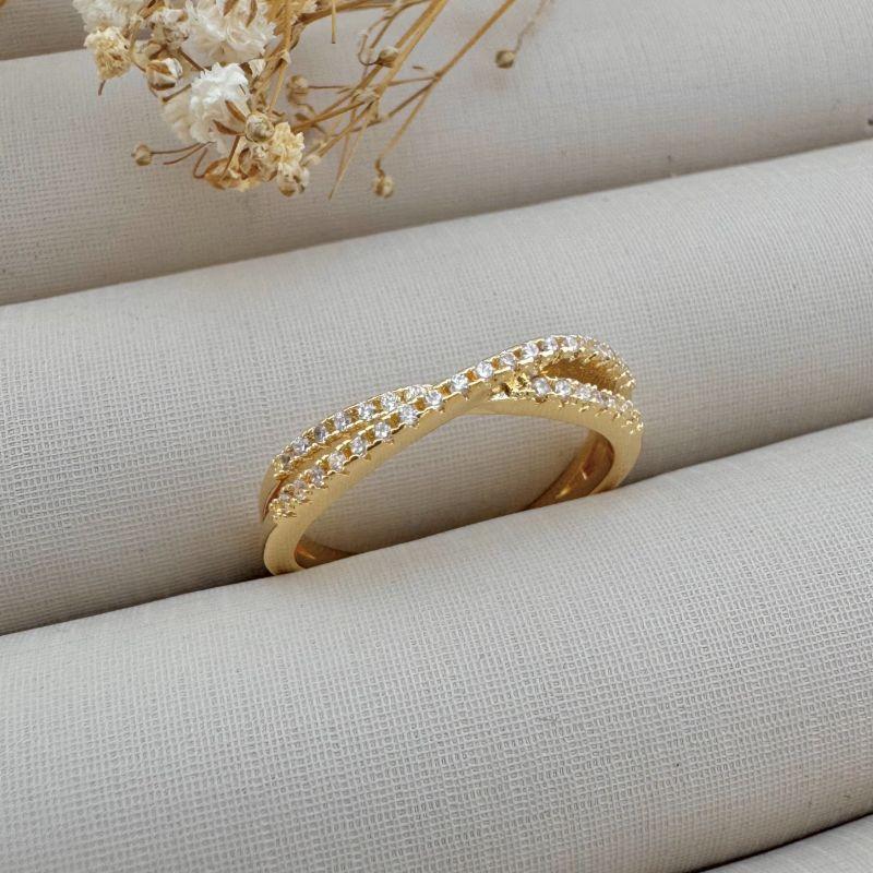 03.2358.1.O - (19) Anel de aro duplo transpassado cravejado