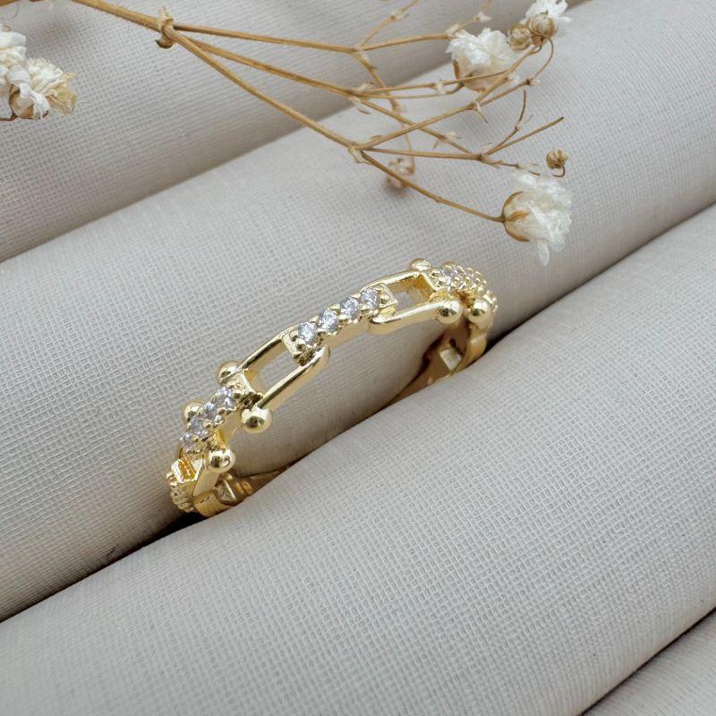 03.2361.1.O - (20) Anel de elos tiffany com centro cravejado