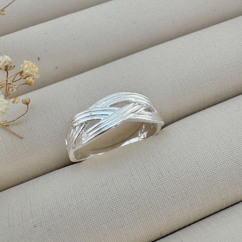 03.2373.0.S - (19) Anel de aro plano em efeito trê em trança