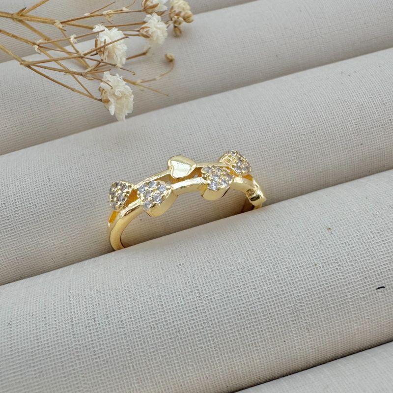 03.2379.1.O - (17) Anel de aro duplo fino com corações de varias cravações