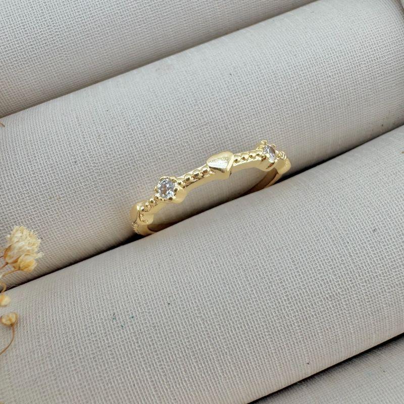 03.2384.1.O - (15) Anel com aro em spikes e mini corações e pontos de luz