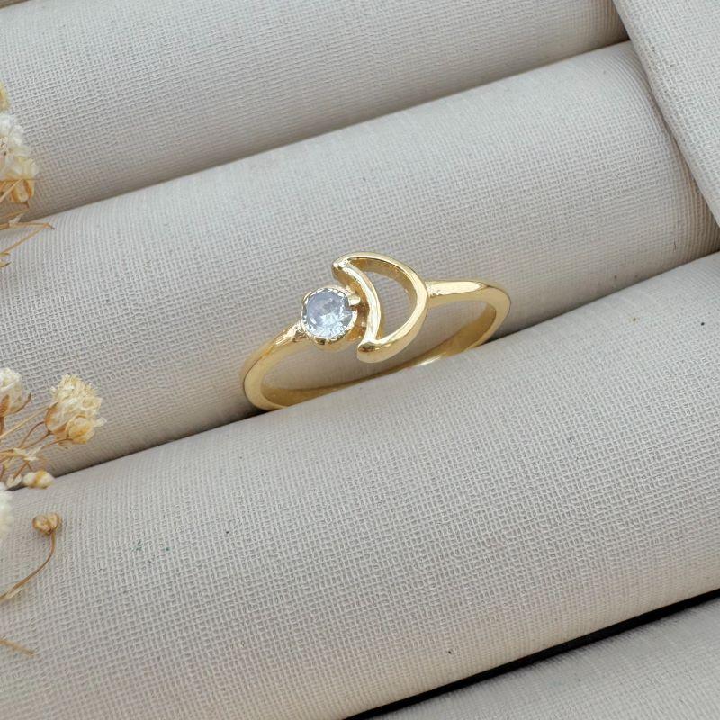 03.2385.1.O - (17) Anel de aro fino com silhueta de Lua com ponto de luz