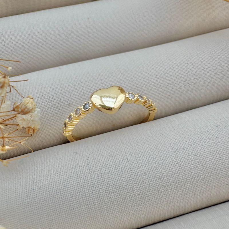 03.2386.1.O - (22) Anel de coração liso com aro cravejado em ingles spike