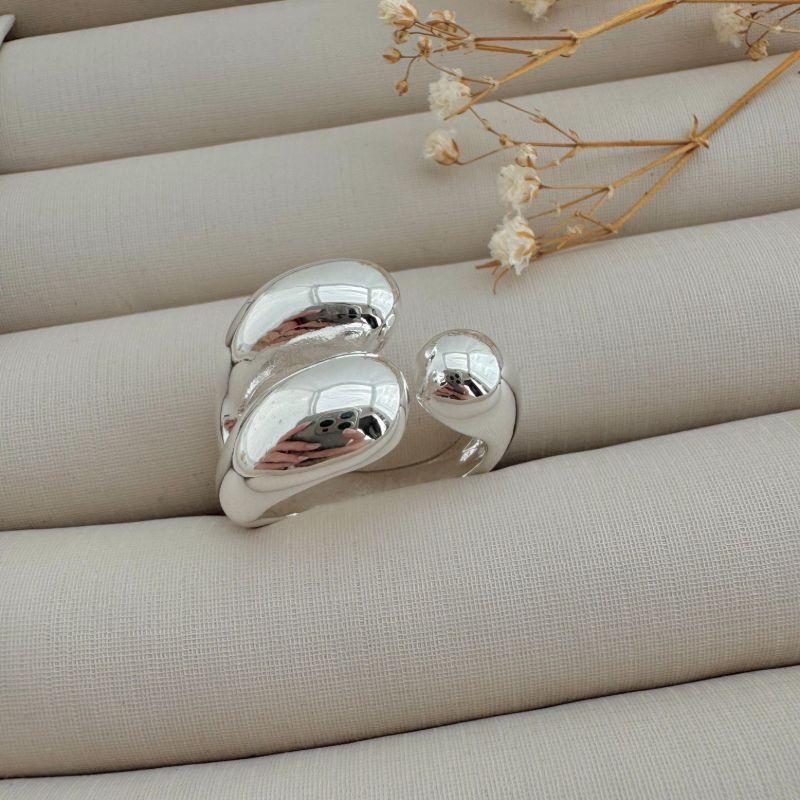 03.2406.0.S - (19) Anel de três gotas separadas com central aberto