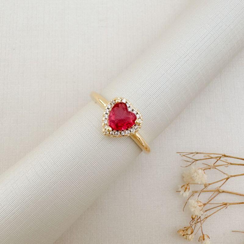 03.2426.6.O - (21) Anel solitário de pedra em coração com uma fileira de cravação em volta